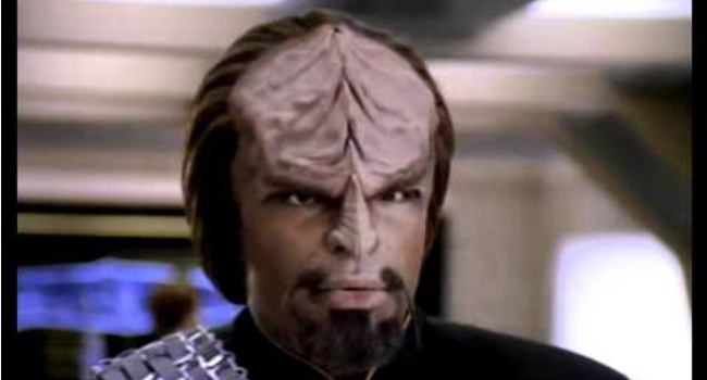 Star Trek's Worf standing on the deck of the enterprise