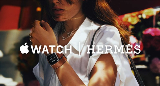 a woman wearing apple watch by hermes