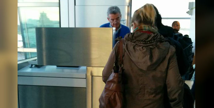 Michael O'leary checking passengers in